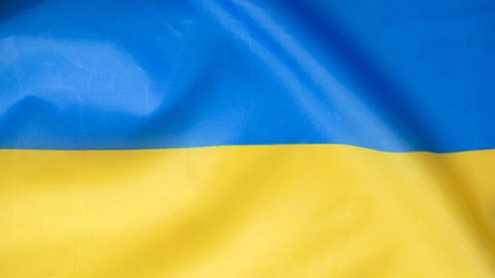 54760500-national-flag-of-ukraine-fabric-textile-background.jpg