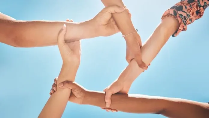 mp58290177-team-of-people-support-hands-connect-or-link-together.webp.webp