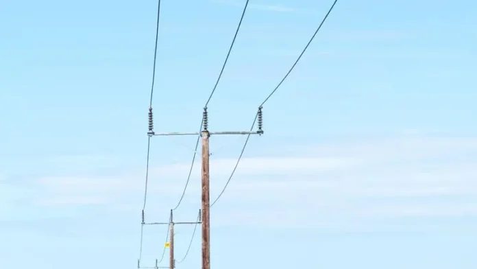 27370095-power-lines-in-a-landscape.webp.webp